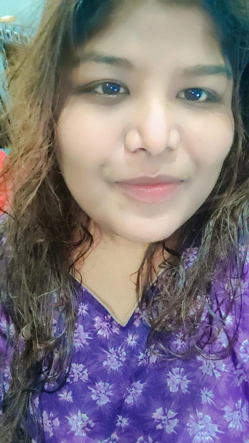 Shamsa in purple dress